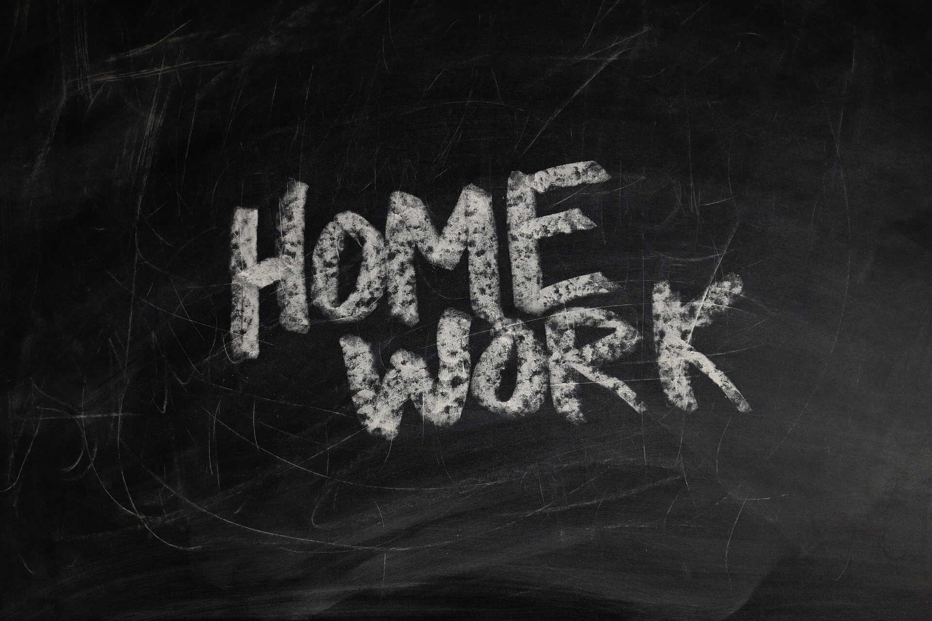 A blackboard background with "home work" written on it in white chalk