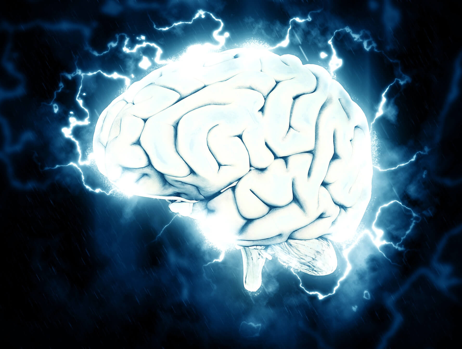 a stylised picture of a brain with sparks around it